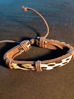 Men's Brown Leather Adjustable Bracelet with Animal Print Accent